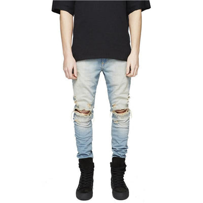 DISTRESSED WASHED JEANS