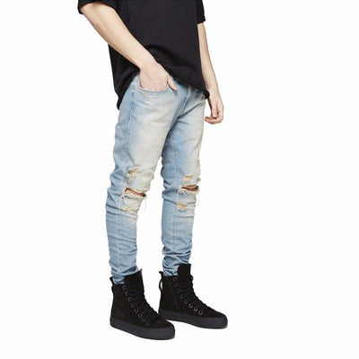 DISTRESSED WASHED JEANS