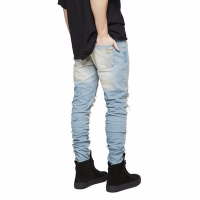 DISTRESSED WASHED JEANS