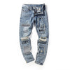 DISTRESSED GRAFFITI JEANS