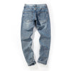 DISTRESSED GRAFFITI JEANS