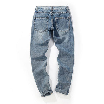 DISTRESSED GRAFFITI JEANS