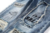 DISTRESSED GRAFFITI JEANS