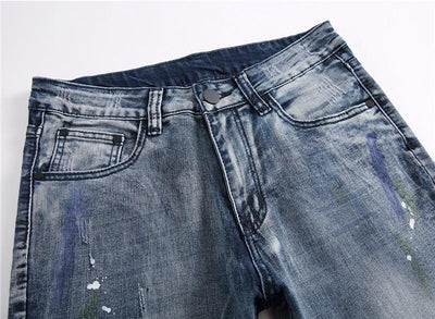 DISTRESSED PAINTER JEANS