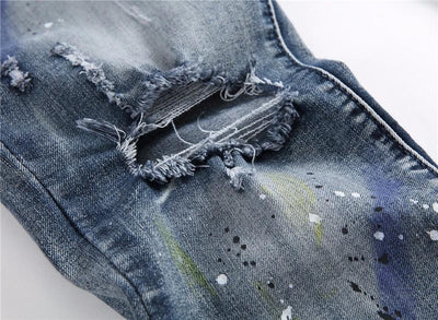 DISTRESSED PAINTER JEANS