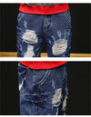 HYPER DISTRESSED BLUE JEANS